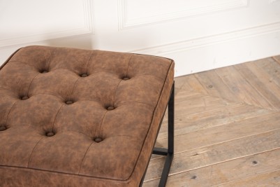 brown leather footstool